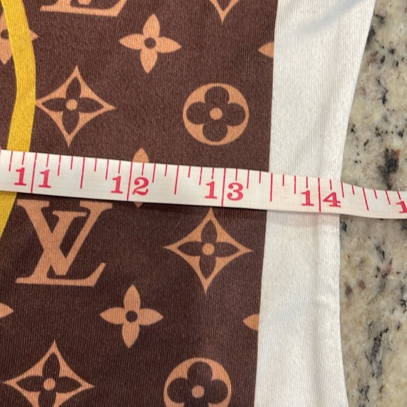White cap sleeve tee with LV logo. No care tags. Feels like rayon/cotton blend. - Picture 9 of 11